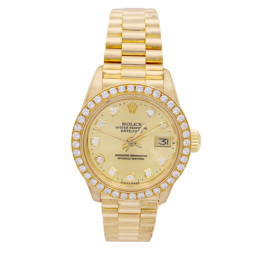 Montre Rolex,"Oyster Pertpetual Datejust", or jaune, diamants.