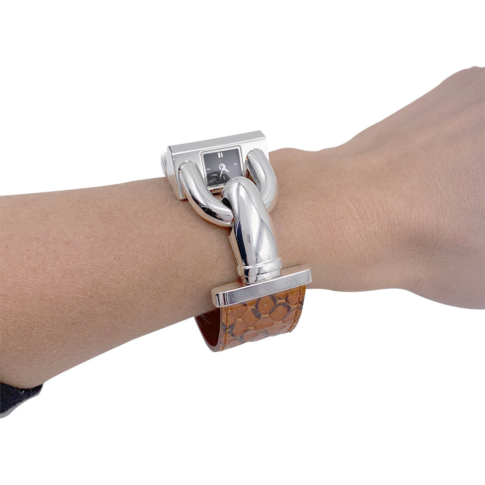 Van Cleef & Arpels watch, “Cadenas”, steel, leather.