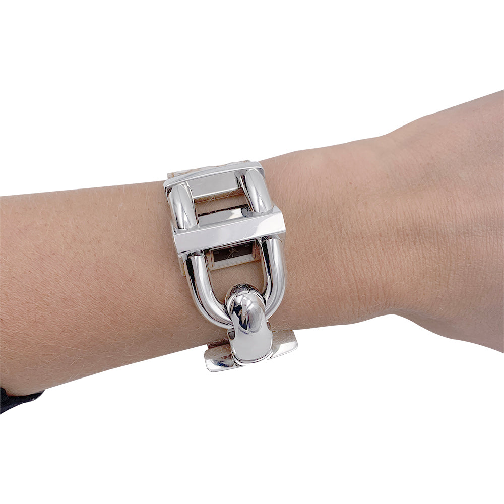 Van Cleef & Arpels watch, “Cadenas”, steel, leather.