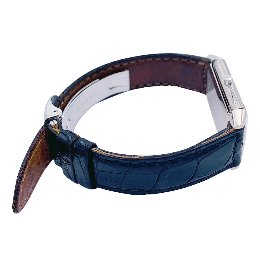 Montre Jaeger Lecoultre, "Reverso", or blanc, acier, cuir.
