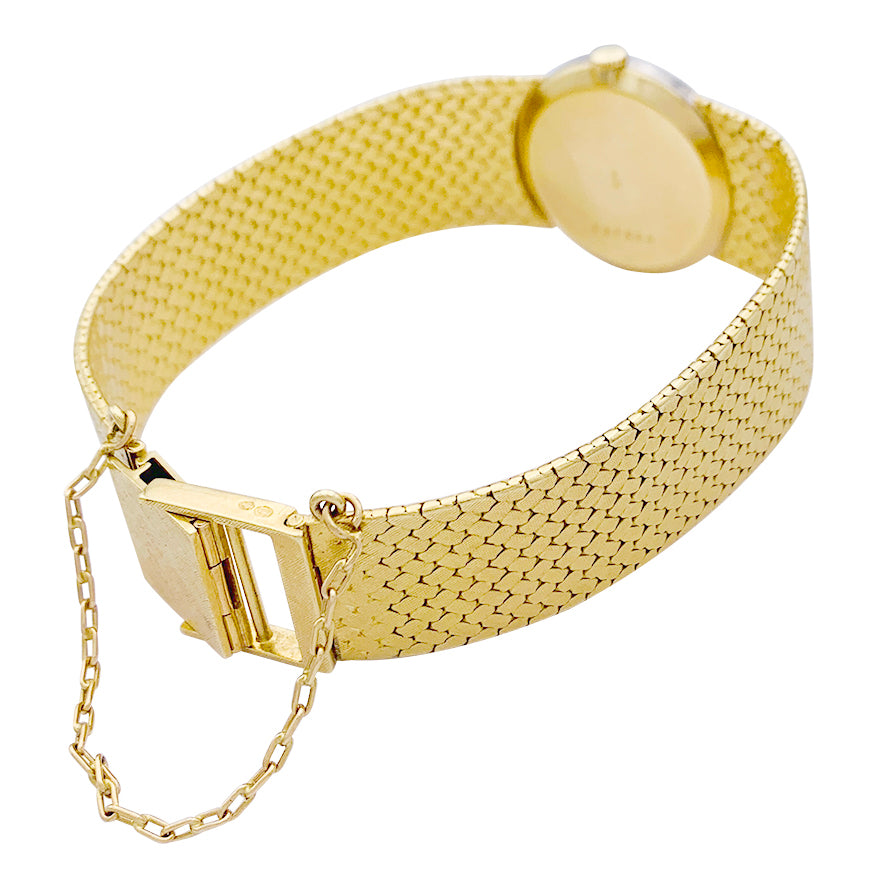 Montre Vacheron Constantin vintage, or jaune, or blanc et diamants.
