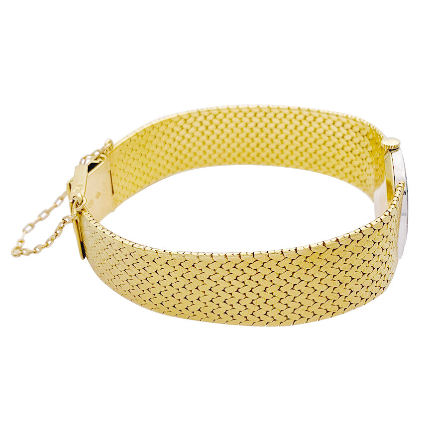 Montre Vacheron Constantin vintage, or jaune, or blanc et diamants.