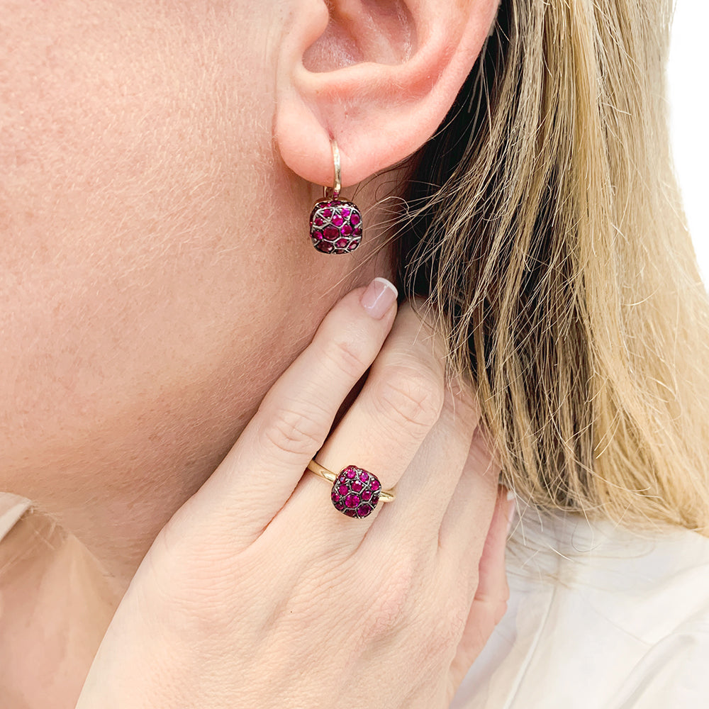 Pomellato ring, "Nudo", two golds, rubies.