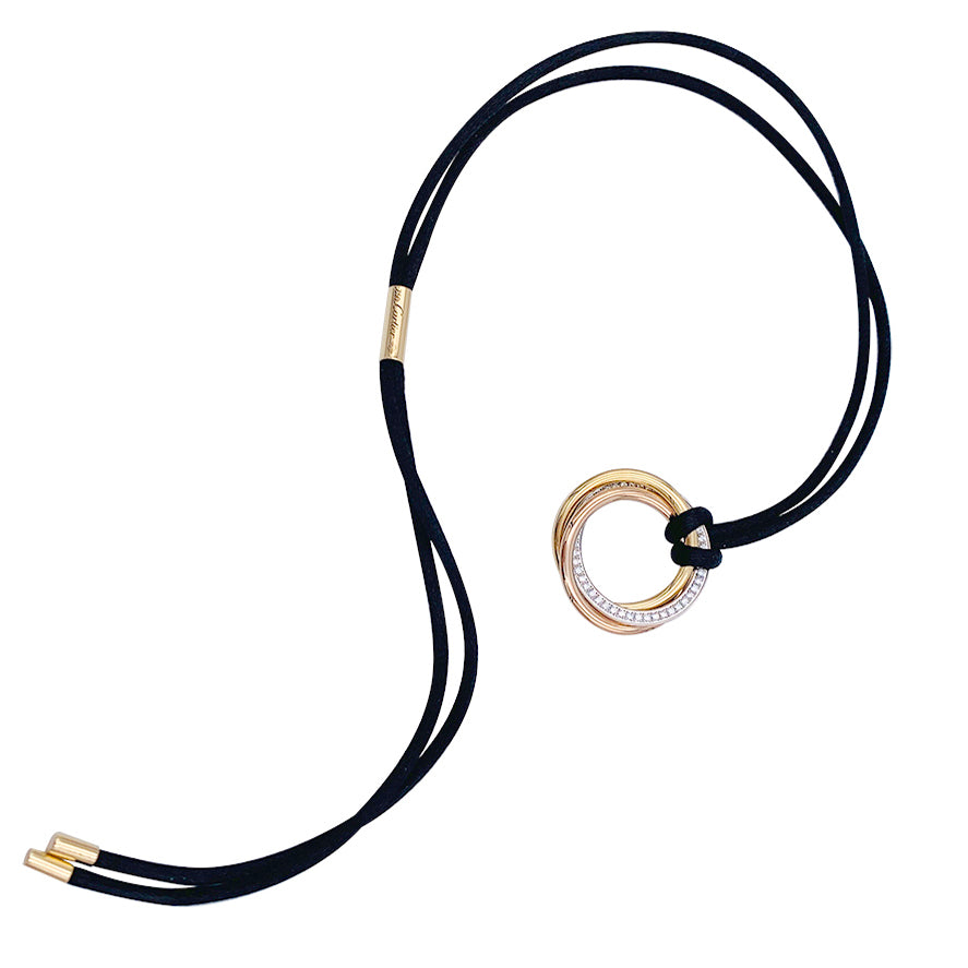 Cartier necklace, "Trinity", three golds, diamonds.