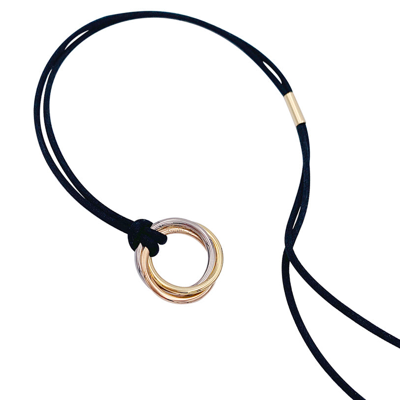 Cartier necklace, "Trinity", three golds, diamonds.