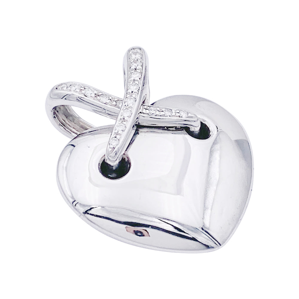 Pendentif coeur Chaumet, "Liens", or blanc et diamants.