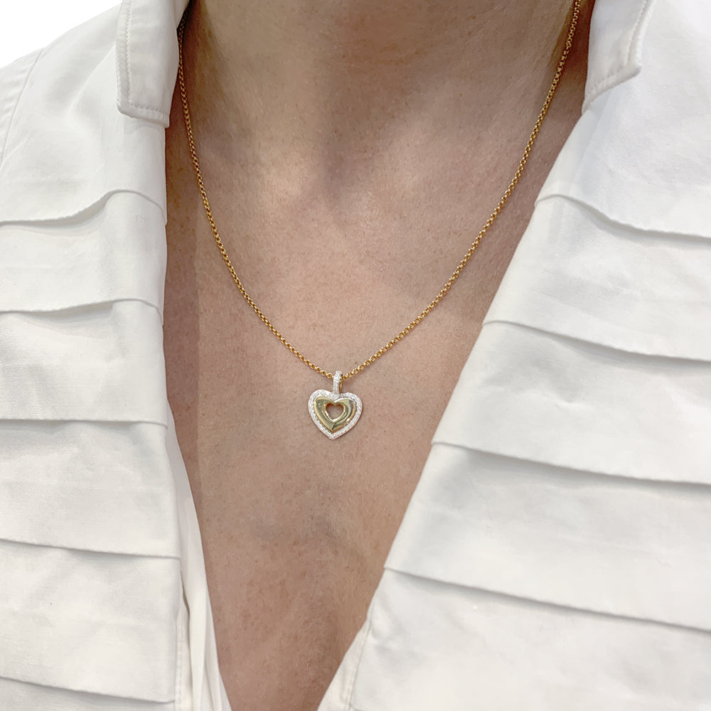 Poiray pendant, "Secret Heart", yellow gold, white gold and diamonds.