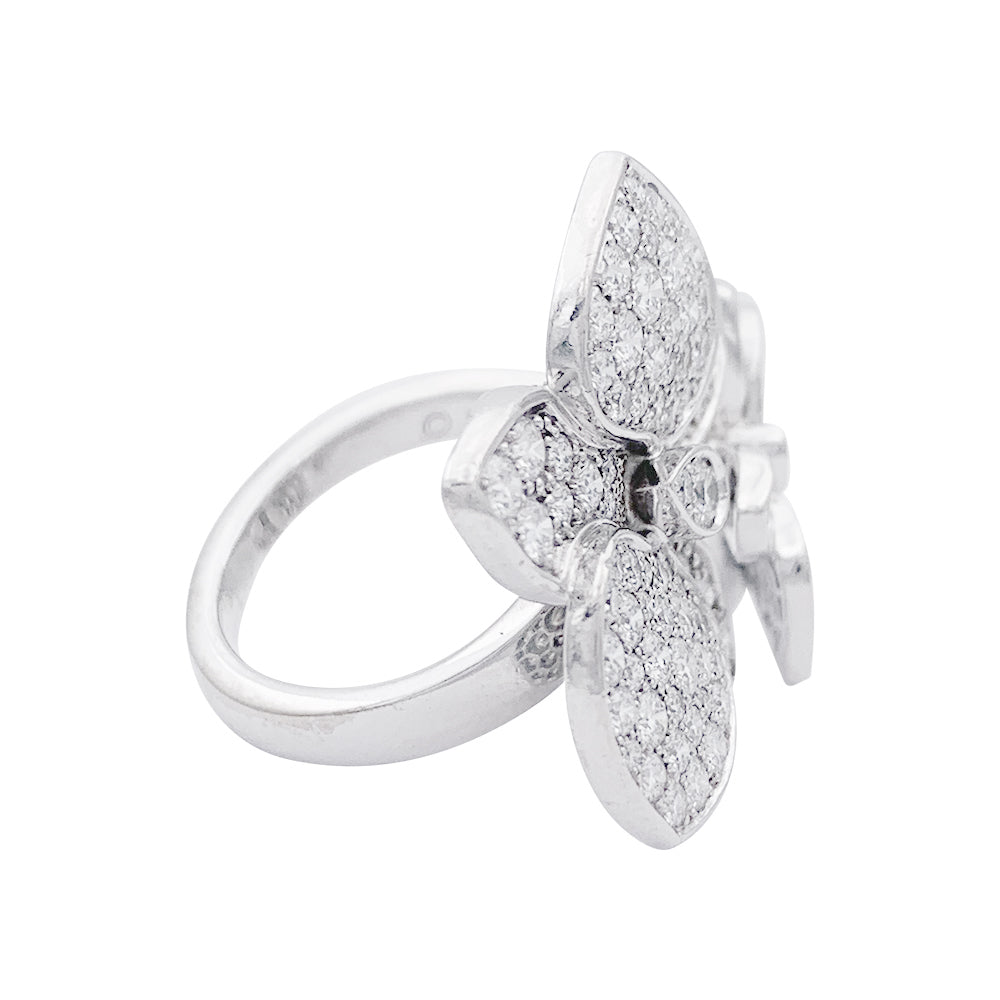 Bague Cartier, "Caresse d'Orchidées", or blanc, diamants.