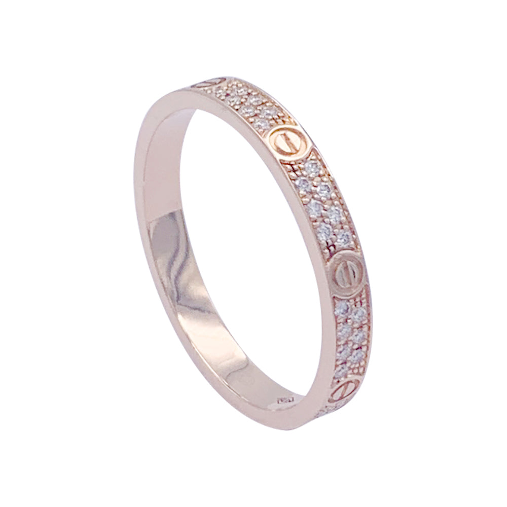 Bague Cartier, "Love", or rose, diamants.
