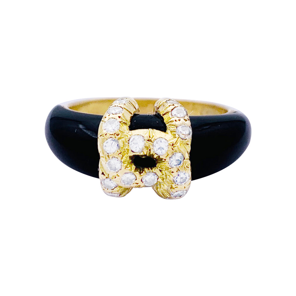 Cartier ring, "Double C", yellow gold, onyx, diamonds.