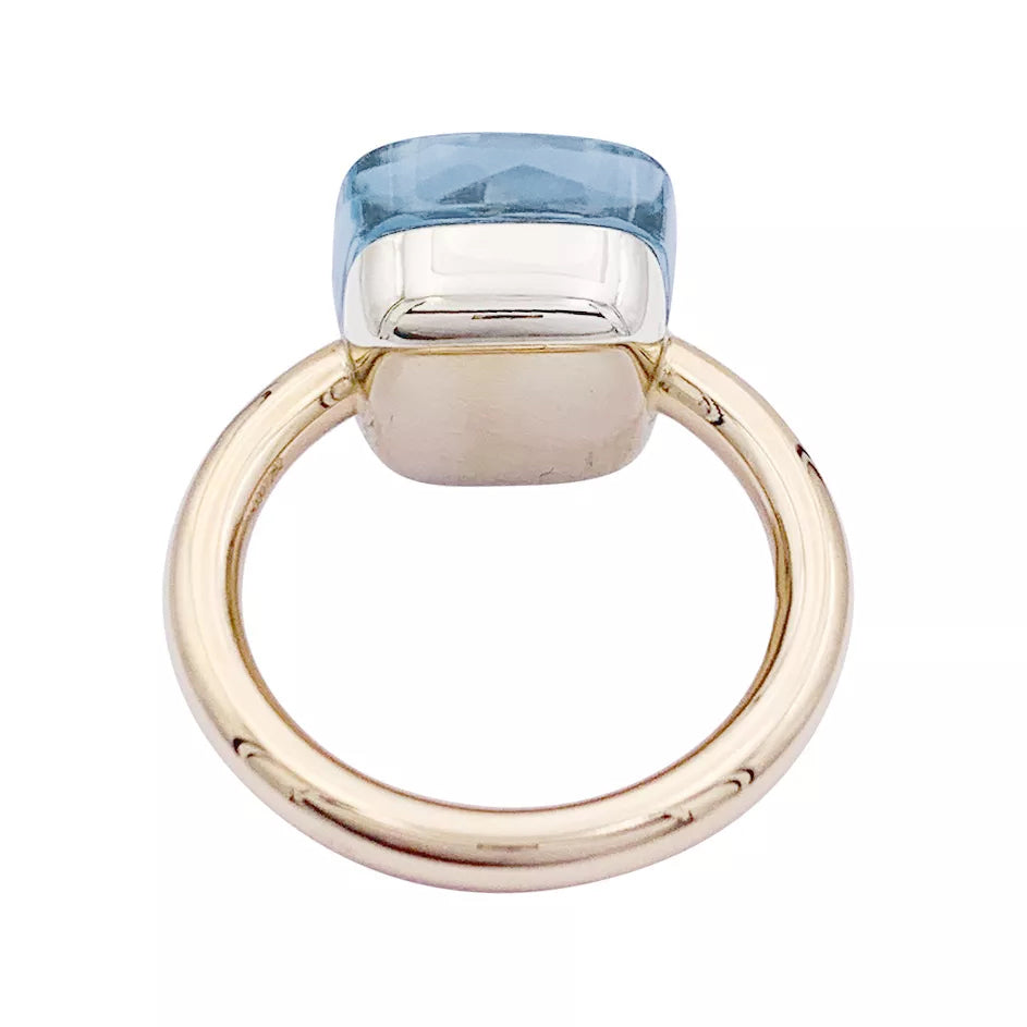 Bague Pomellato, "Nudo Maxi", deux ors et topaze bleue.