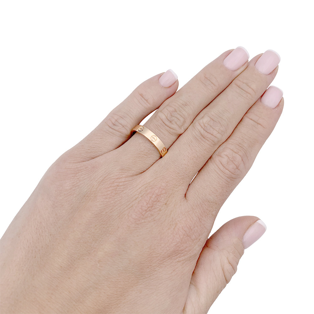 Bague Cartier, "Alliance Love", or rose.