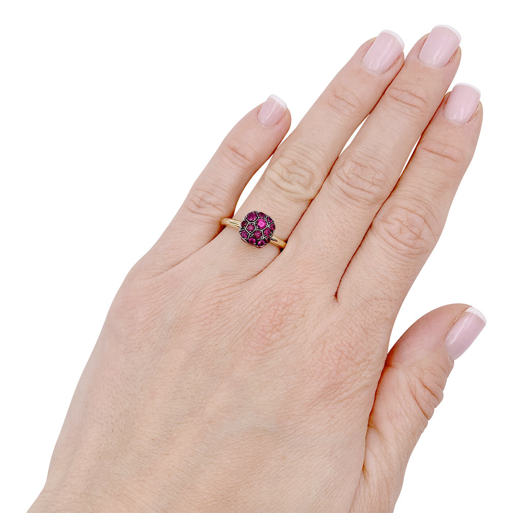 Pomellato ring, "Nudo", two golds, rubies.