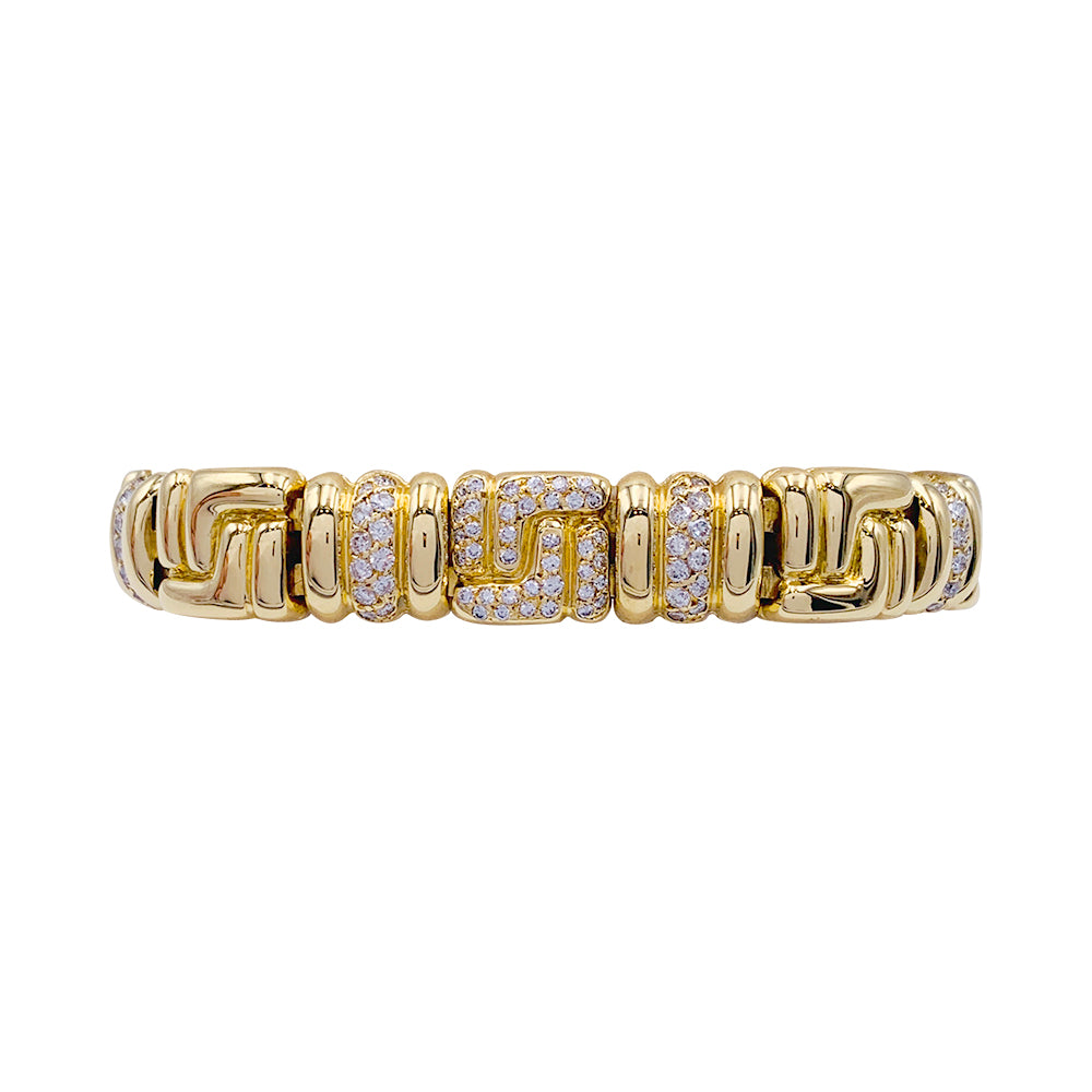 Boucheron bracelet, yellow gold, diamonds.