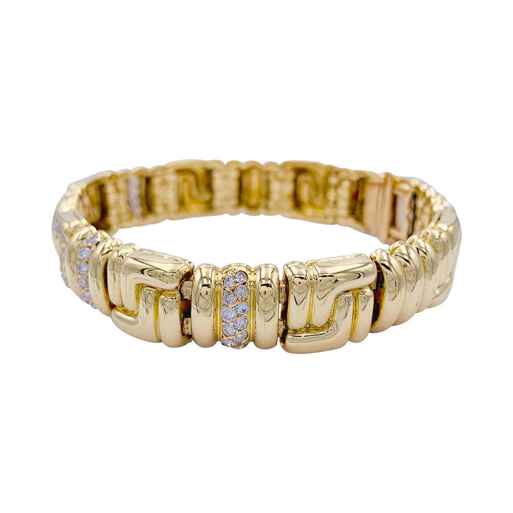 Boucheron bracelet, yellow gold, diamonds.