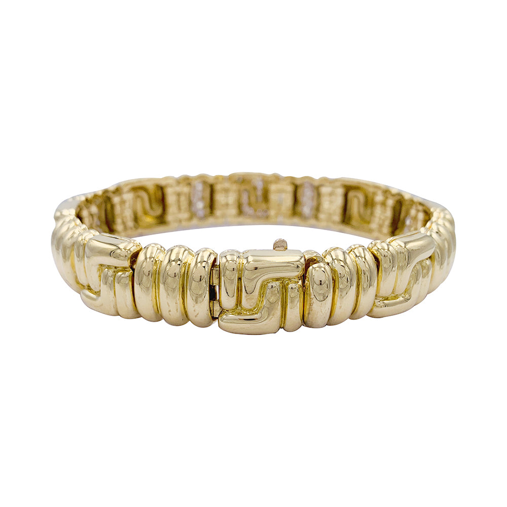 Boucheron bracelet, yellow gold, diamonds.