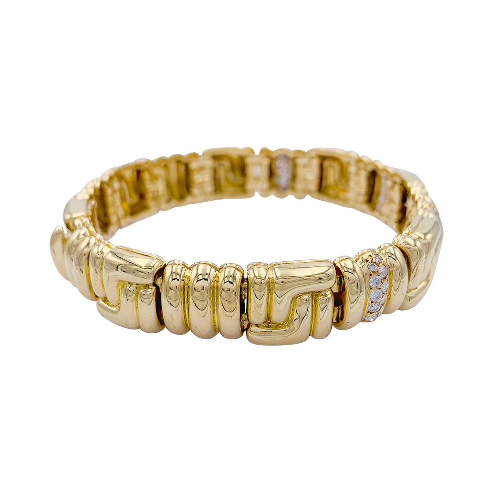 Boucheron bracelet, yellow gold, diamonds.
