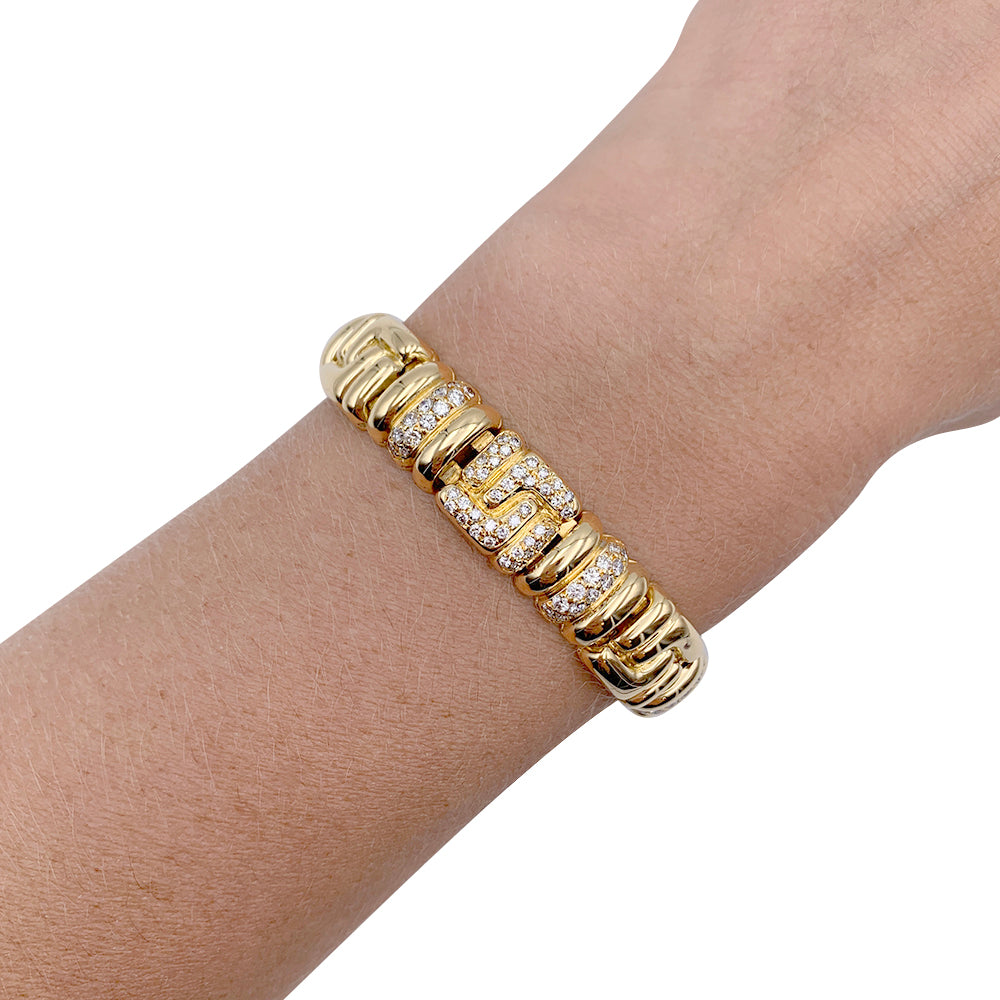 Boucheron bracelet, yellow gold, diamonds.