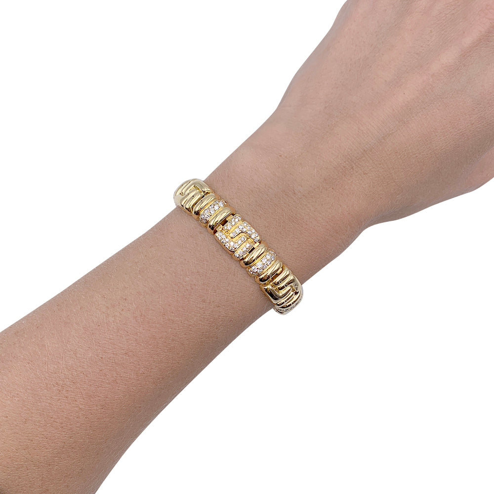 Boucheron bracelet, yellow gold, diamonds.