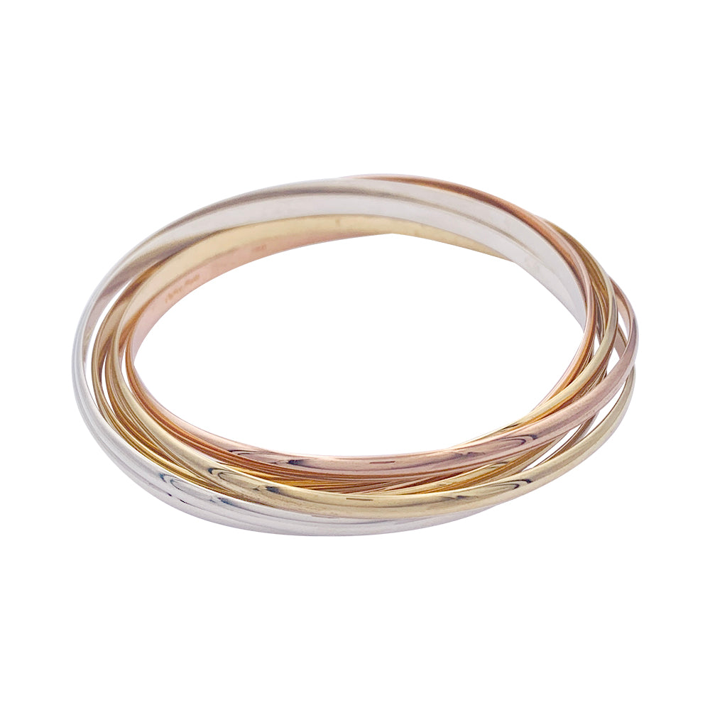 Cartier bracelet, "Trinity Semainier", three golds.