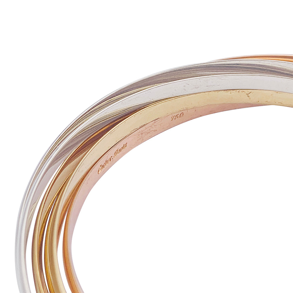 Cartier bracelet, "Trinity Semainier", three golds.