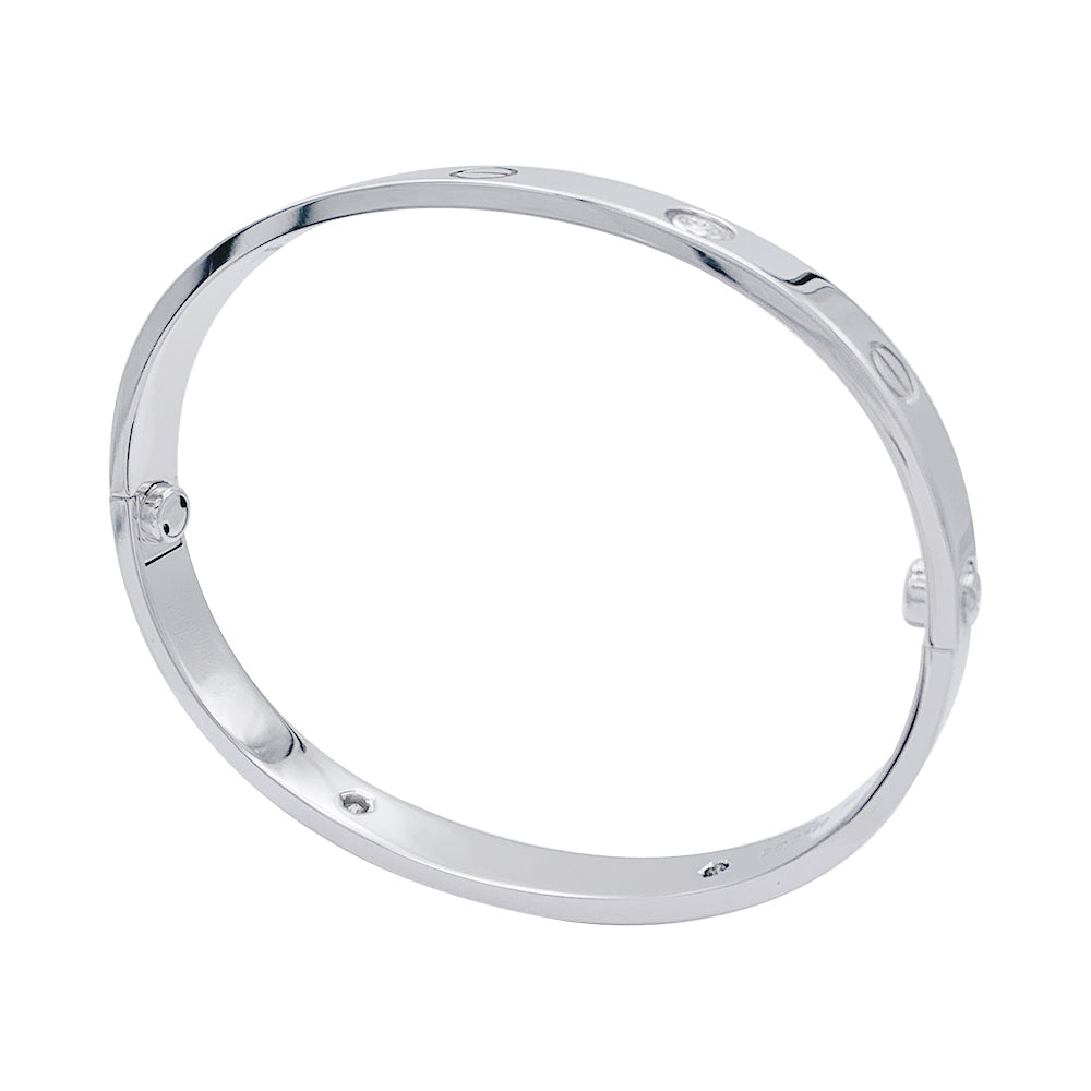Cartier "Love" bracelet, white gold and diamonds.