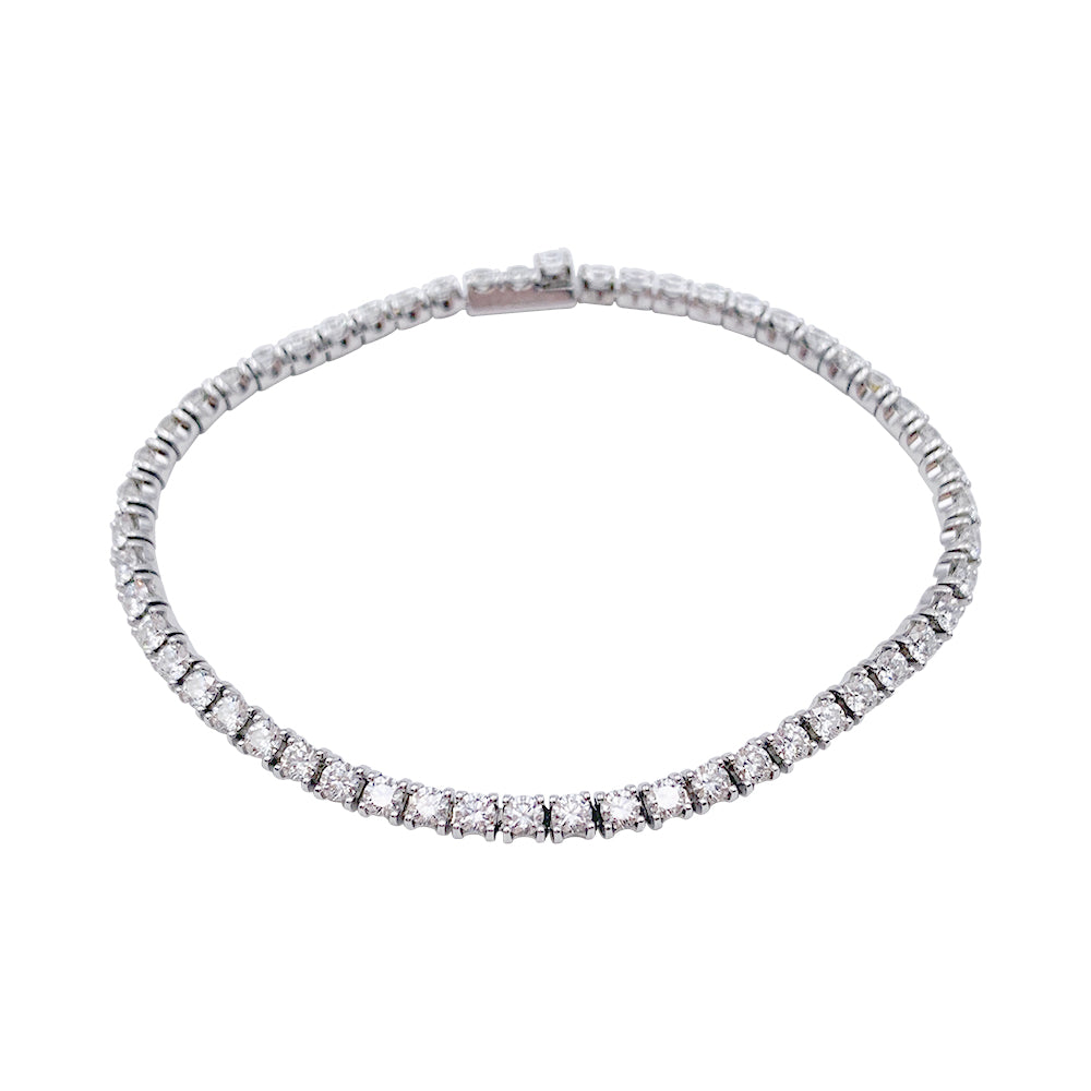 Bracelet Cartier, "Lignes Essentielles", or blanc, diamants.