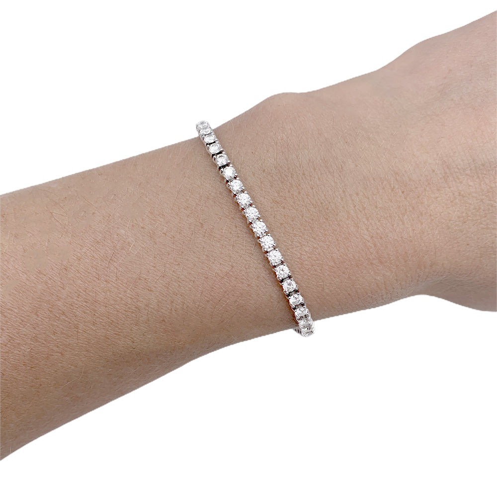 Cartier bracelet, "Essential Lines", white gold, diamonds.