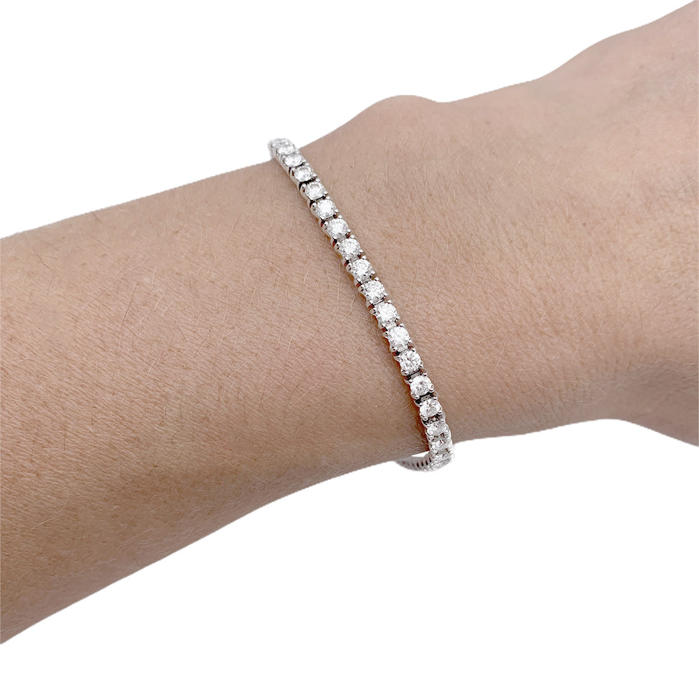 Cartier bracelet, "Essential Lines", white gold, diamonds.