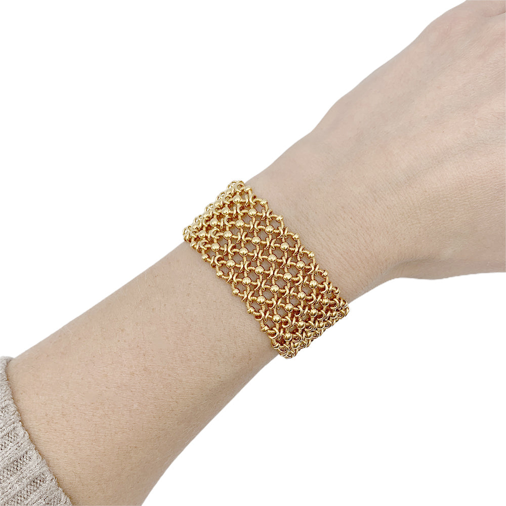 Vintage Cartier bracelet, "Résille", yellow gold.