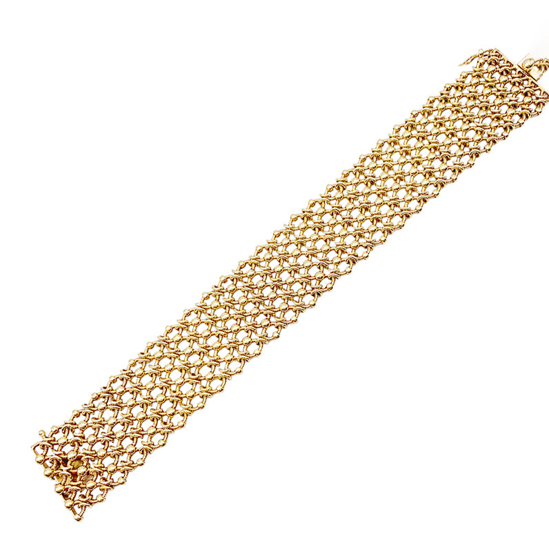 Vintage Cartier bracelet, "Résille", yellow gold.