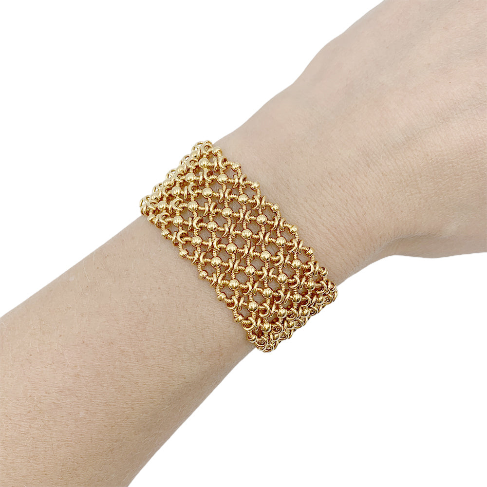 Vintage Cartier bracelet, "Résille", yellow gold.
