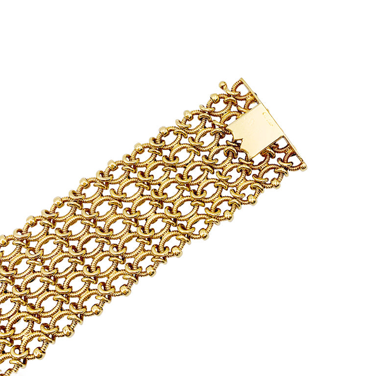 Vintage Cartier bracelet, "Résille", yellow gold.