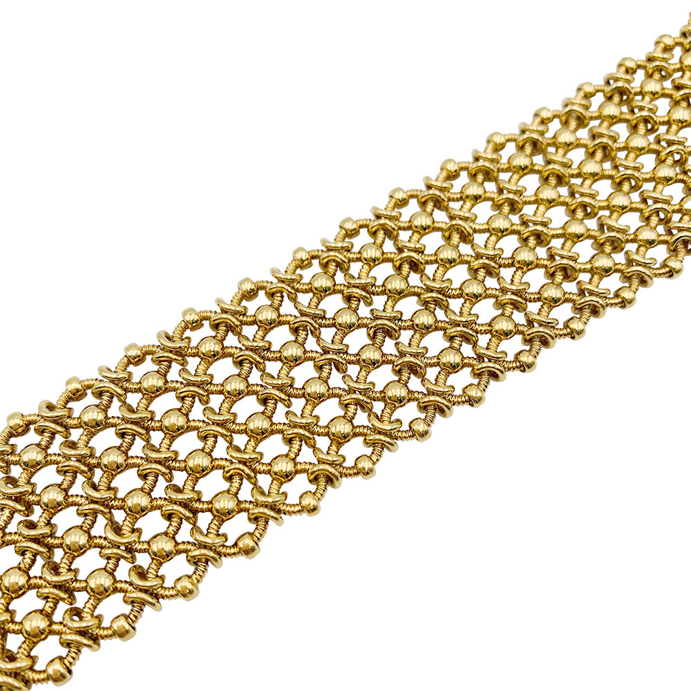 Vintage Cartier bracelet, "Résille", yellow gold.