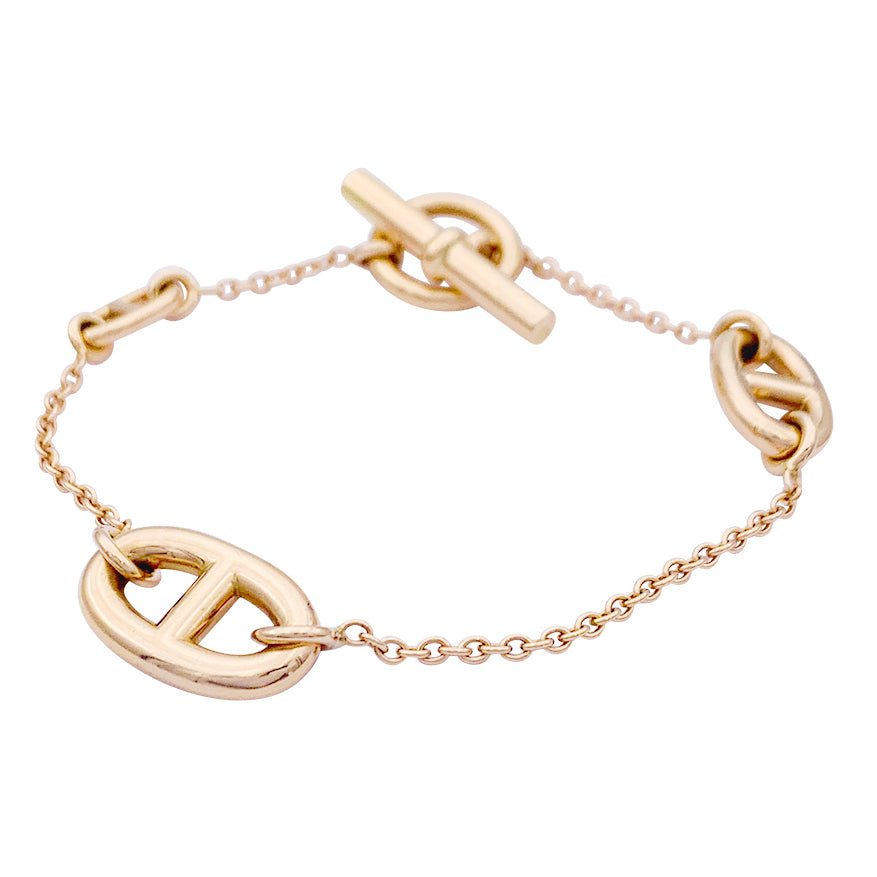 Bracelet Hermès, "Farandole", or rose.