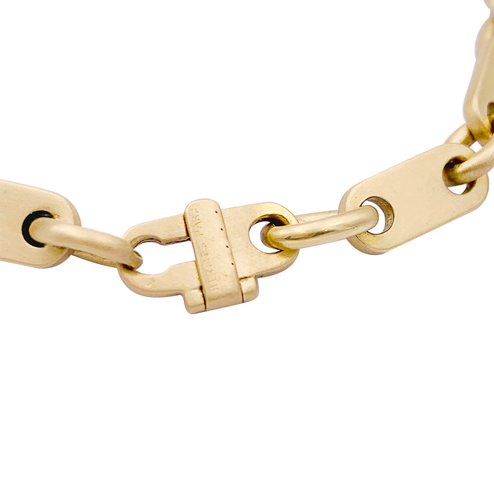 Hermès yellow gold bracelet.