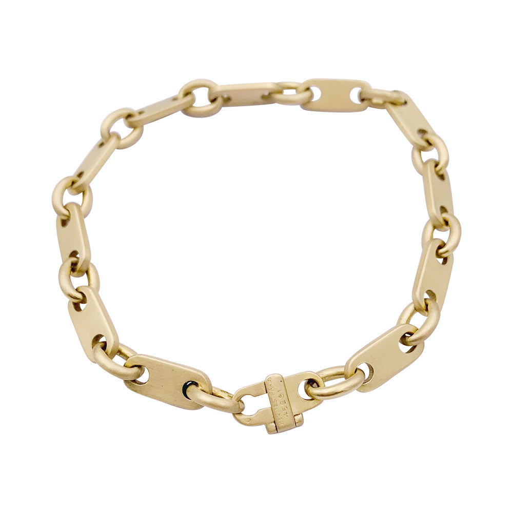 Hermès yellow gold bracelet.