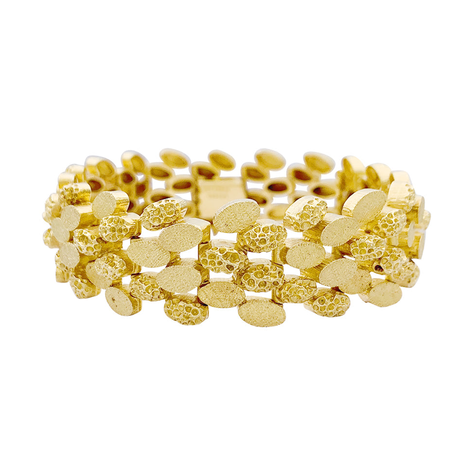 Bracelet vintage Mellerio en or jaune.