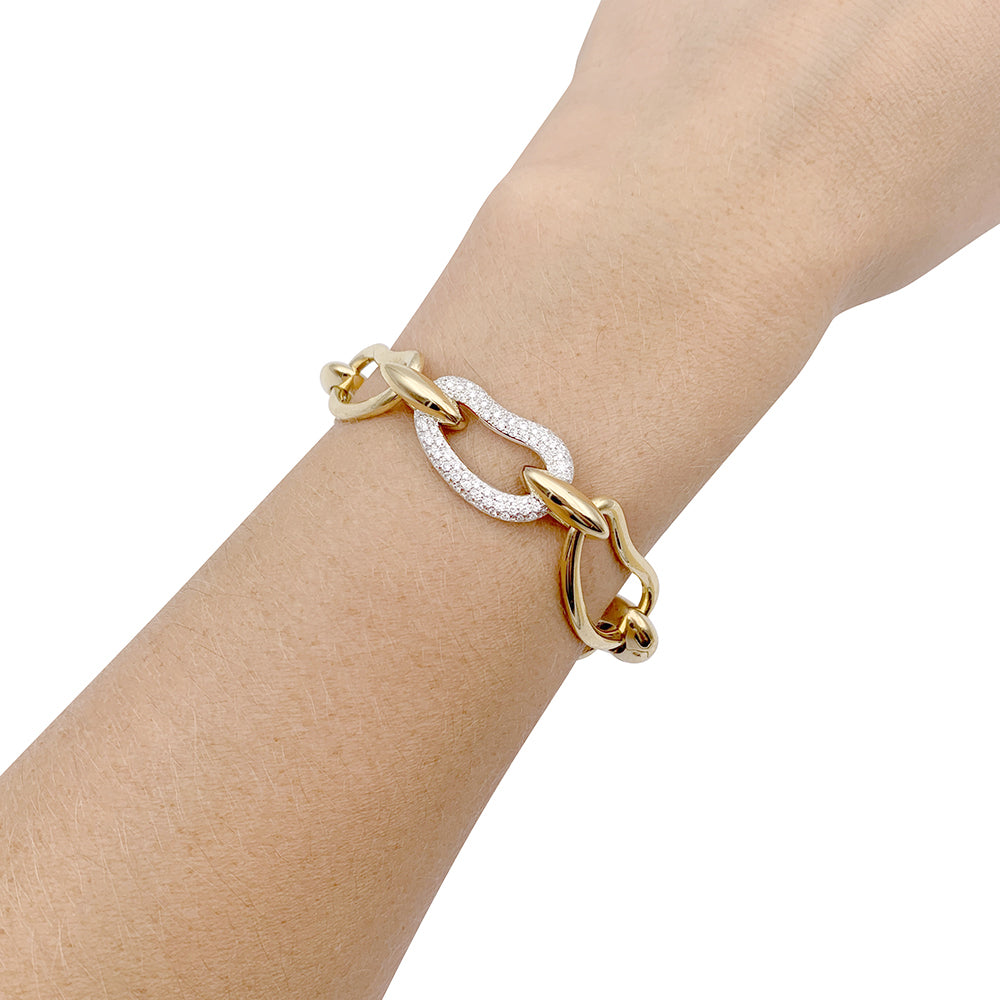 Pomellato bracelet, "Paisley", yellow gold, white gold, diamonds.