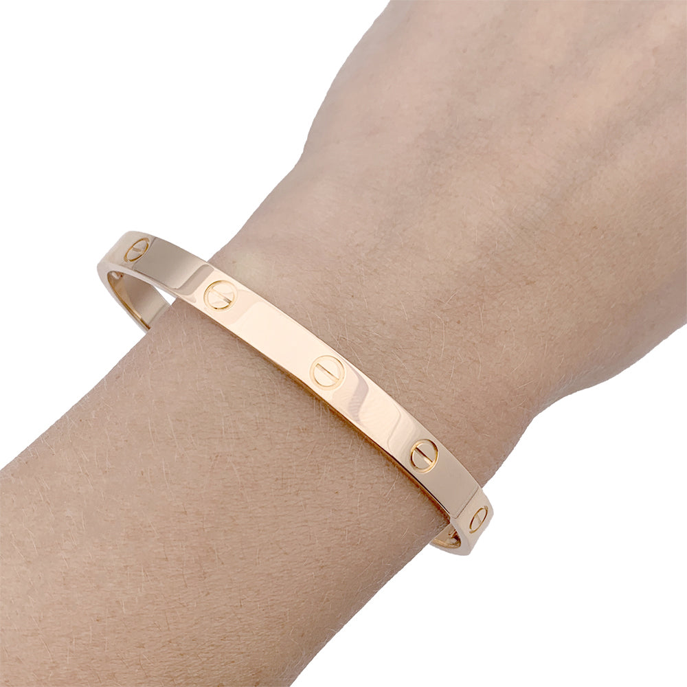 Cartier bracelet, “Love”, in pink gold.