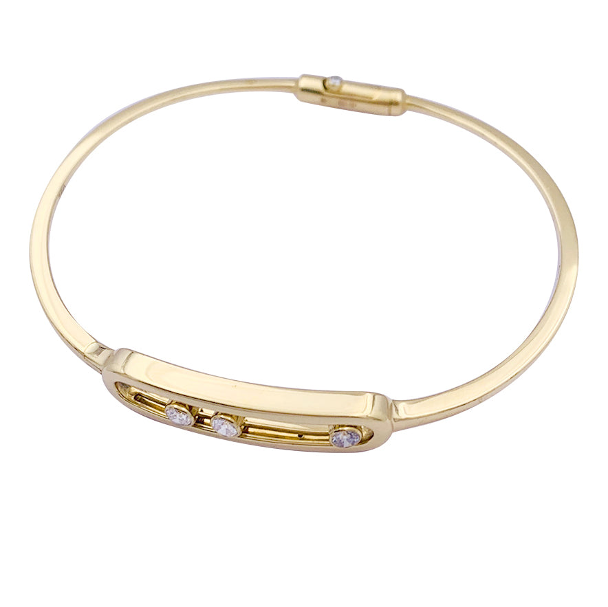 Messika bracelet, “Jonc Move”, yellow gold, diamonds.