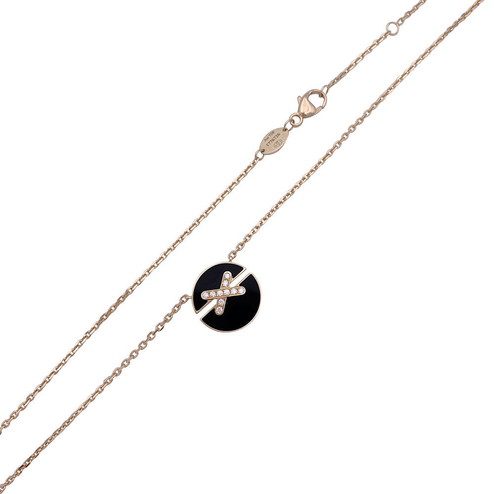 Collier Chaumet ,"Jeux de Liens", or rose, diamants et onyx.