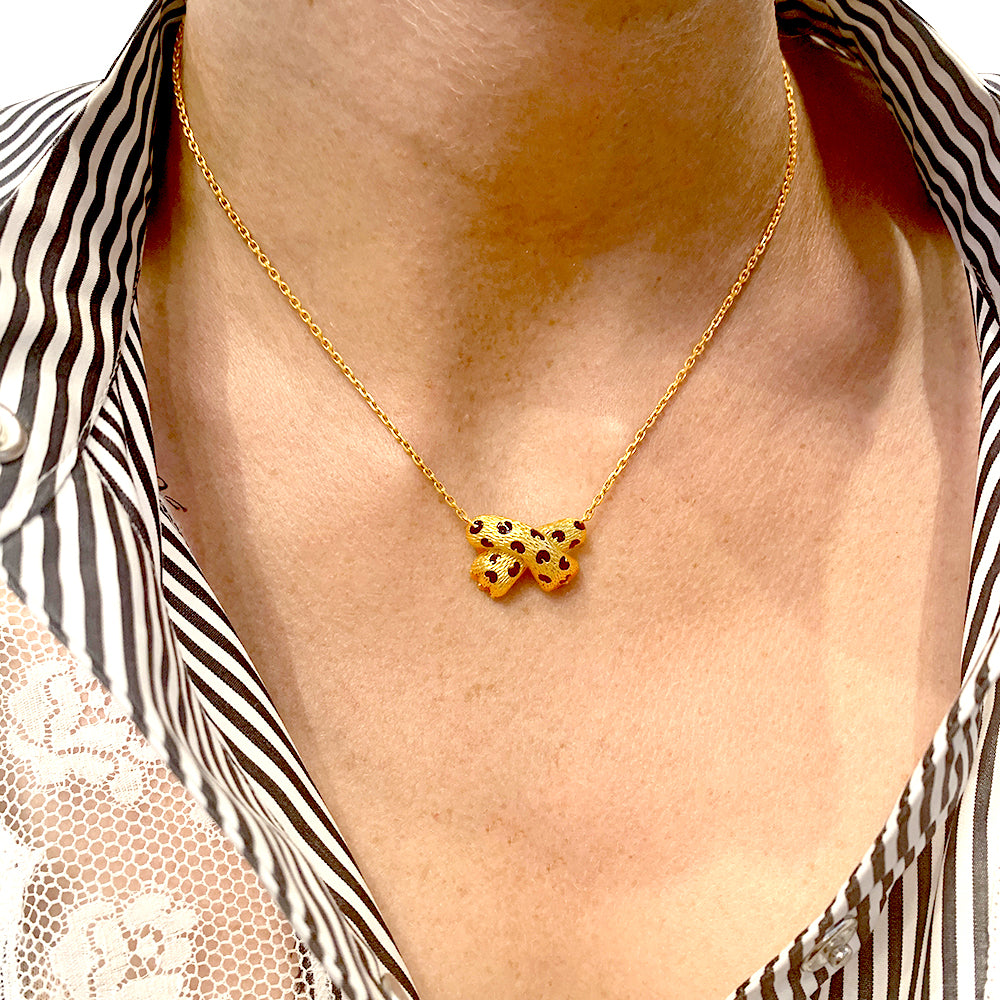 Fred necklace, “Ombre Féline”, yellow gold, enamel.