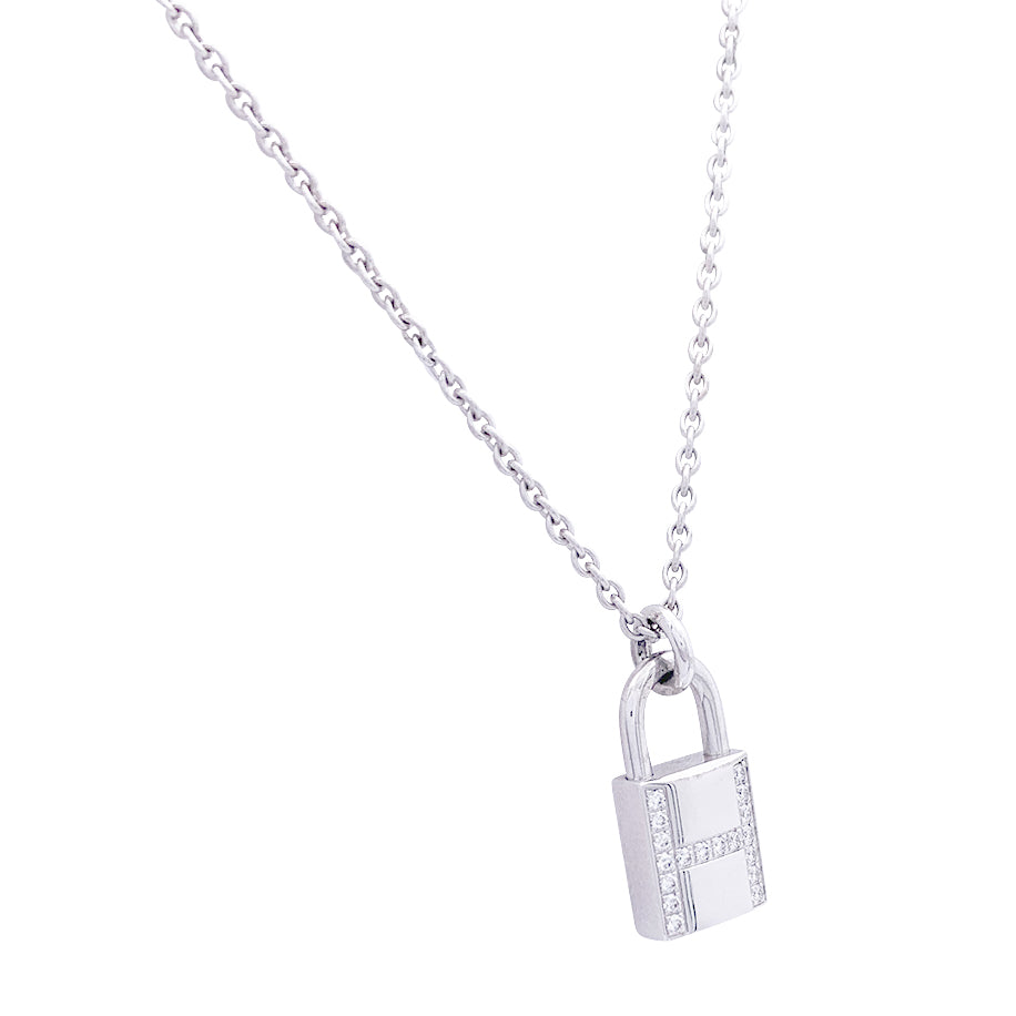 Collier Hermès "Kelly Cadenas" or blanc, diamants.