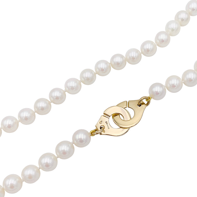 Dinh Van pearl necklace, "Menottes R15", in yellow gold.