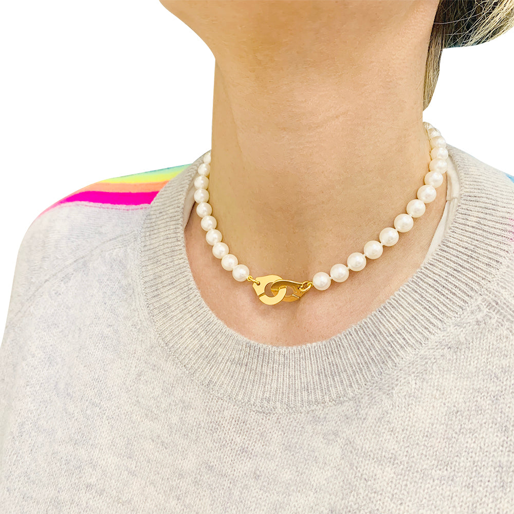 Dinh Van pearl necklace, "Menottes R15", in yellow gold.