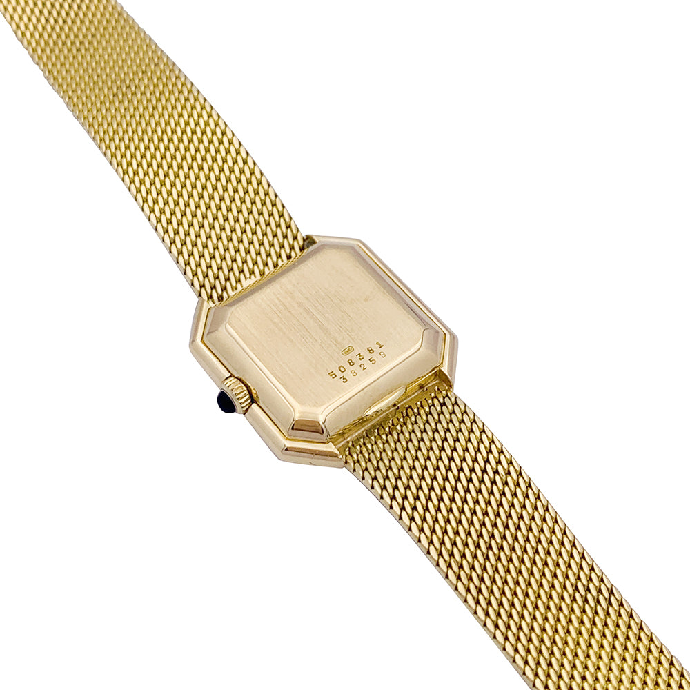 Montre vintage Baume & Mercier, or jaune.