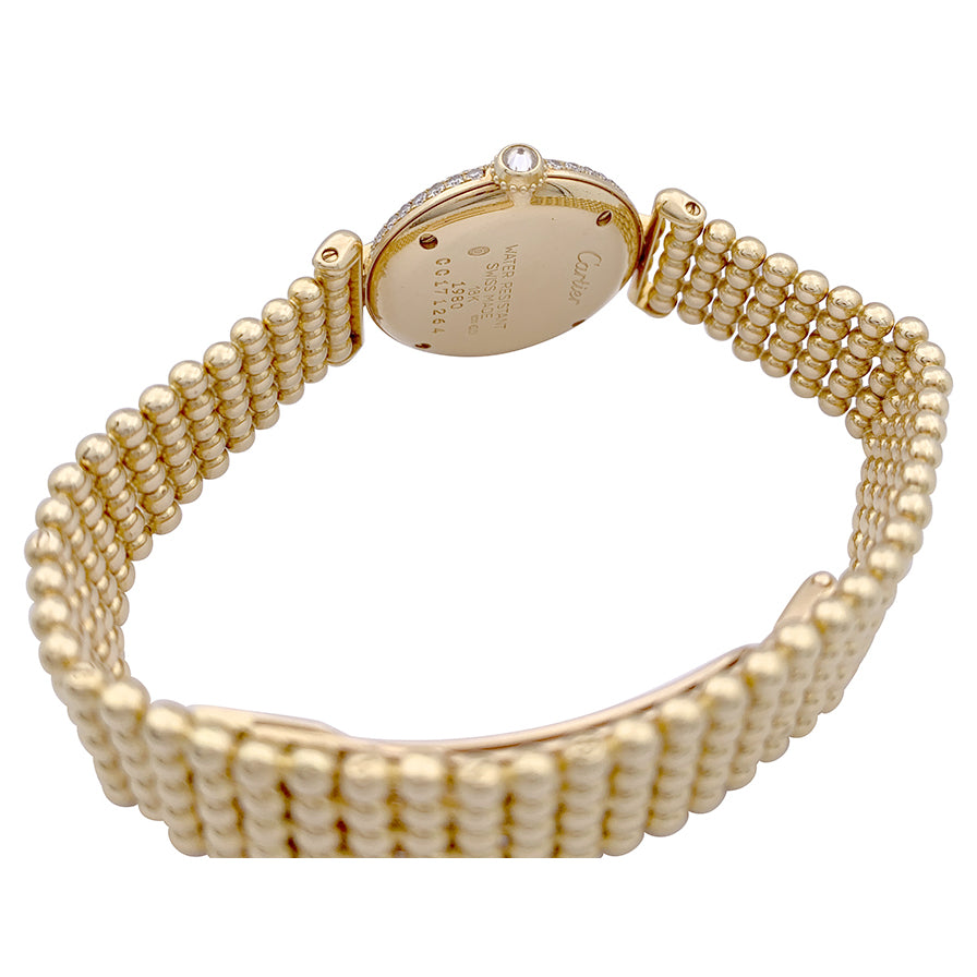 Cartier "Colisée" watch, yellow gold and diamonds.