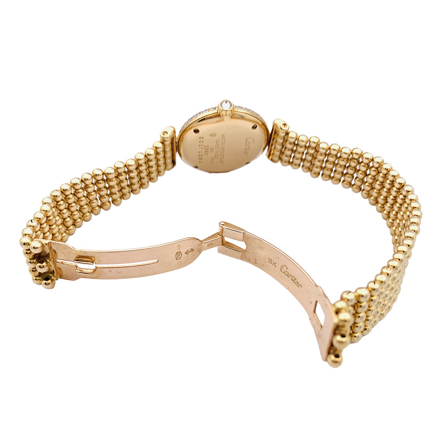 Cartier "Colisée" watch, yellow gold and diamonds.