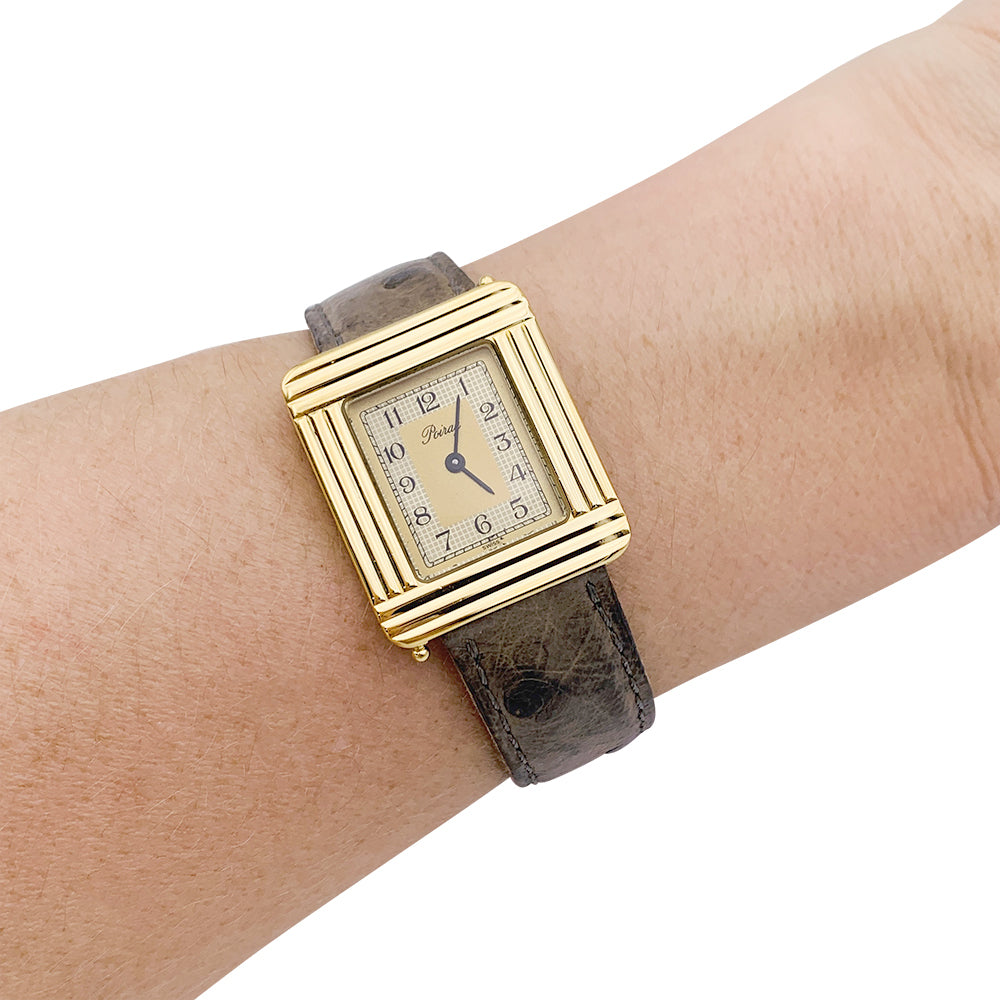 Montre Poiray ,"Ma Première", en or jaune, bracelet cuir interchangeable.